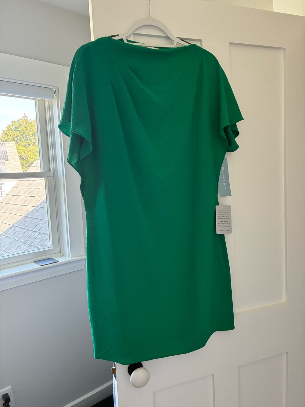 London Times Emerald Green Flutter-Sleeve Shift dress. It’s really cute on!